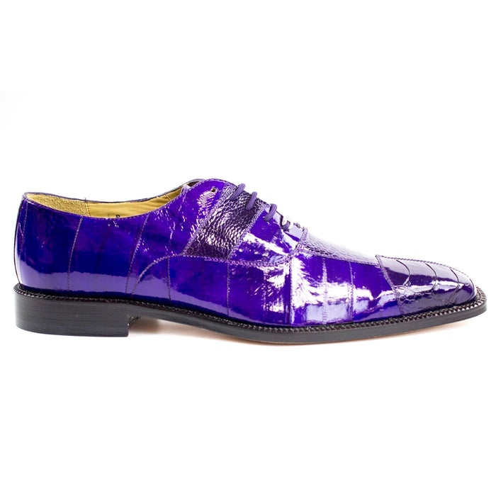 Men's Belvedere Mare dress shoe. Pointed silhouette with a rounded cap toe. Features polished purple eel ostrich leather with a textured pattern. Elegant design.
