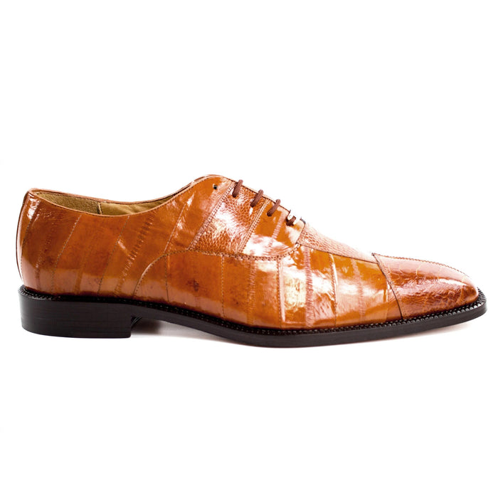 Tan men's Belvedere Mare dress shoe with cap toe. Features eel and ostrich textured leather panels. Streamlined design with pointed toe and black leather sole.
