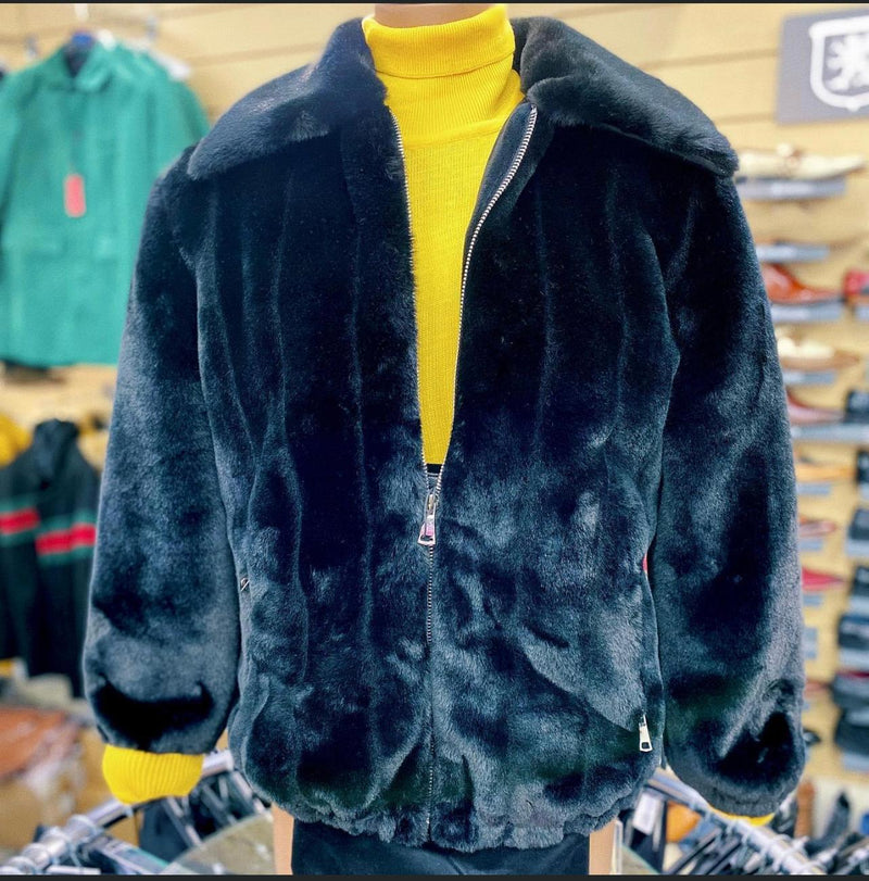 Men's black faux fur jacket. Luxury winter design with plush finish, zip closure, and wide collar. Oversized sleeves with elastic cuffs.
