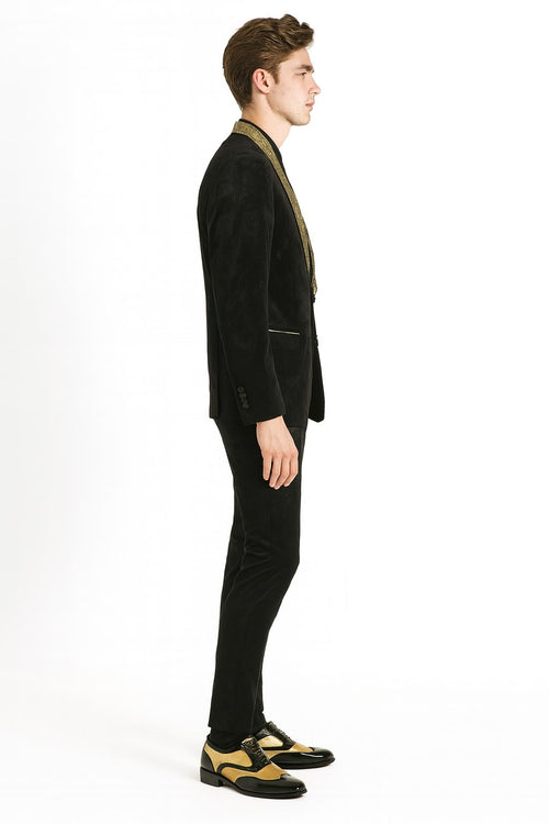 Men's black jacquard tuxedo blazer with gold accents. Luxurious shawl collar and textured fabric. A sophisticated, predominantly black design.
