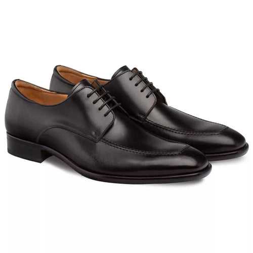 Mezlan Coventry apron oxford in black calfskin. Sleek design, pointed toe, low heel. Polished finish, 5-eyelet lacing. Subtle seam detail, contrasting leather lining.