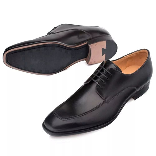 Mezlan Coventry apron oxford: Black calfskin leather, elongated shape, pointed toe. Smooth upper, subtle stitching. Lace closure. Leather/rubber sole, contrasting heel.
