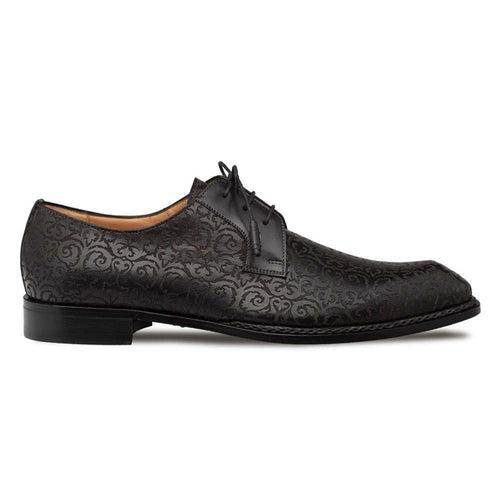 Mezlan Lontani brogue derby shoes. Black and burgundy two-tone patina. Pointed toe, lace-up closure. Smooth leather upper with intricate brogue details. Elevated black heel.

