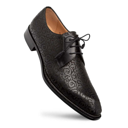 Lontani black & burgundy patina brogue derby shoes. Elongated shape, intricate tonal pattern on smooth black leather upper. Pointed toe, lace-up, contrasting black heel. Sturdy sole. Rich burgundy & black color blend.
