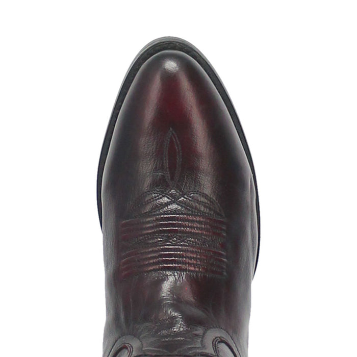 Dan Post Milwaukee cowboy boot. Men's round toe boot in cherry-black leather. Embossed toe pattern. Defined sole.
