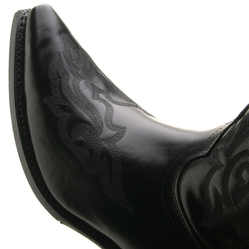Laredo Hawke black western boots: pointed toe, sleek black leather with embossed patterns. Contrasting sole for structure. Stylish and functional design.
