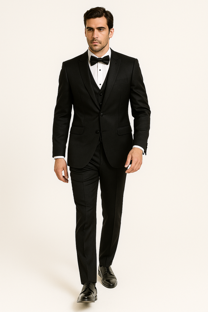 Alberto Nardoni's 4-piece black tuxedo set: single-breasted jacket with peaked lapels, matching trousers, and a bow tie. Includes a white dress shirt for contrast. Smooth, tailored finish.