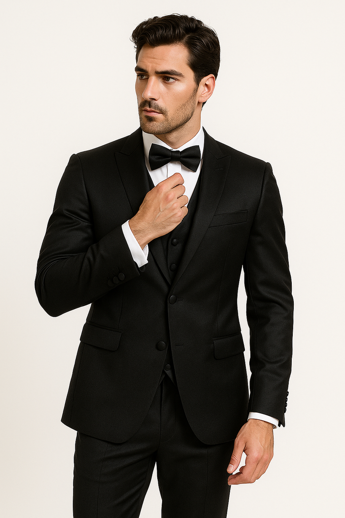 Classic black tuxedo set: fitted jacket (single-button, notched lapels), matching vest, tailored straight-leg trousers (polished sheen), and black bow tie. Formal and elegant.
