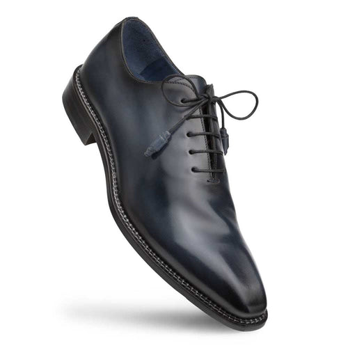 Mezlan's blue calfskin dress shoe: sleek design, plain toe, lace-up closure. Smooth blue leather upper, pointed toe, rounded heel, and visible sole stitching for a structured look.
