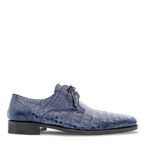 Mezlan Anderson men's exotic lace-up shoe in dark blue crocodile leather. Features a pointed toe, low heel, and textured pattern. Classic lace-up design with matching blue stitching.
