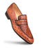 Mezlan Lisbon slip-on loafer in brandy ostrich leather. Streamlined, rounded shape with a flat band. Features a textured pattern, pointed toe, raised heel, and smooth lining for an elegant look.
