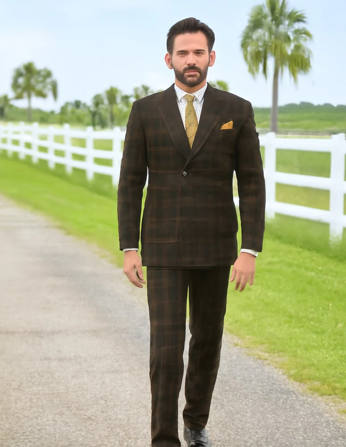 Men's brown plaid double-breasted wool suit with a tailored fit. Structured silhouette, classic design with front flaps. Features a brown base with contrasting plaid, straight-cut trousers.

