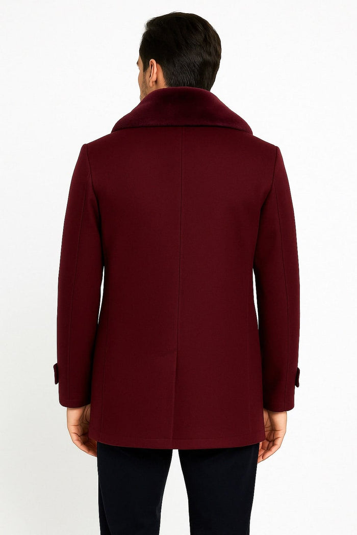 Men's burgundy overcoat with faux fur shawl collar. Double-breasted, structured silhouette, mid-length. Fitted sleeves and clean back lines.

