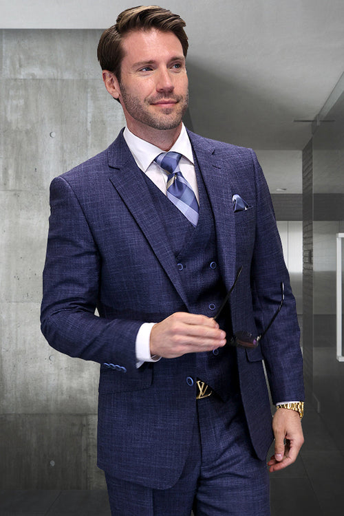 Midnight blue sharkskin men's suit: modern fit, wool, vested. Structured blazer & vest, subtle texture. Tailored trousers. Deep, rich blue.
