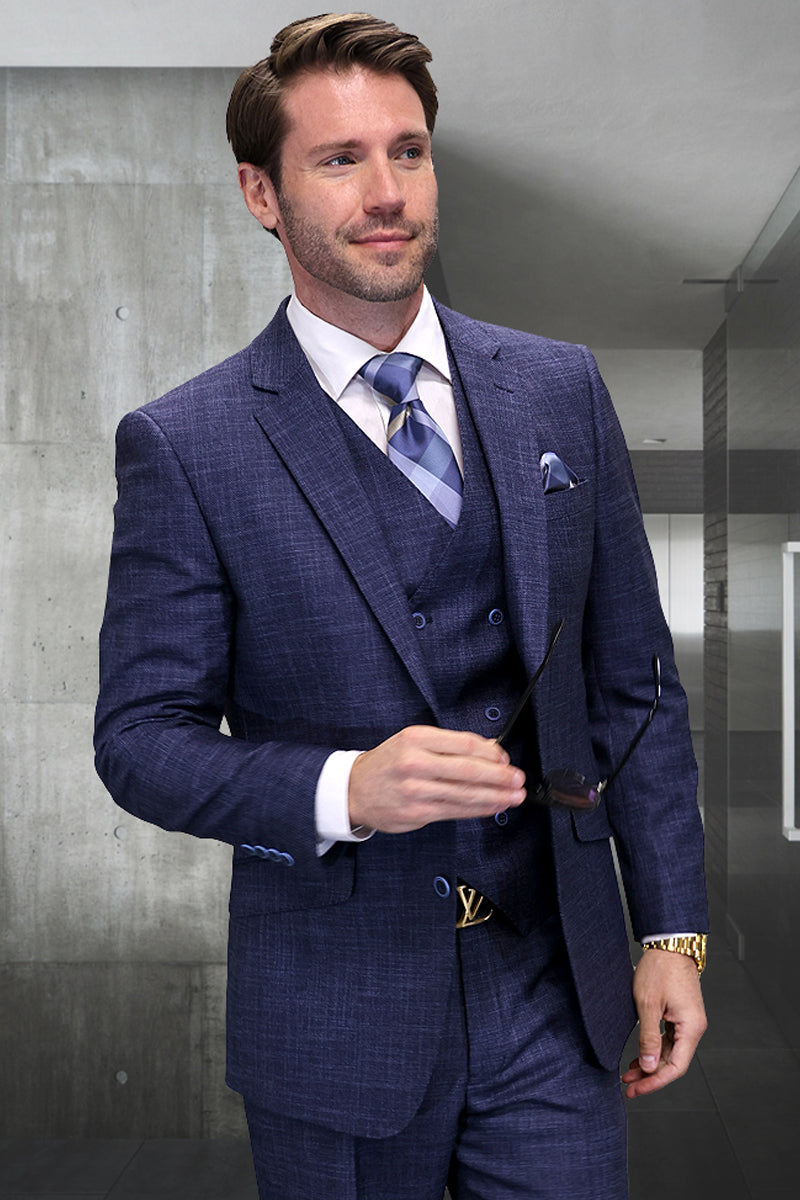 Midnight blue sharkskin men's suit: modern fit, wool, vested. Structured blazer & vest, subtle texture. Tailored trousers. Deep, rich blue.
