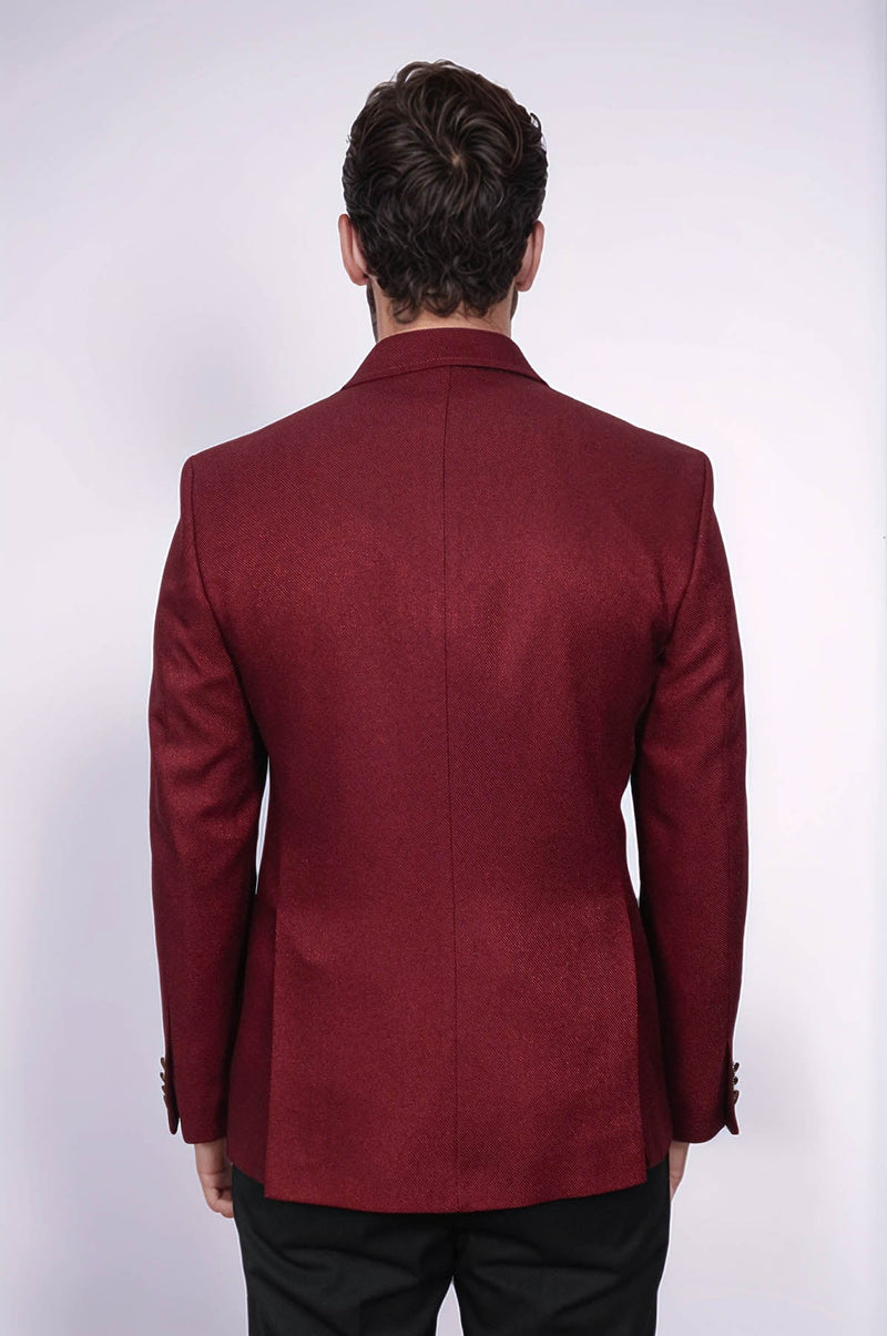 Burgundy blazer with a slim, double-breasted design. Textured fabric, structured silhouette, and standard lapels. Tailored fit with a clean back seam.
