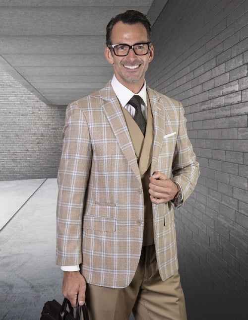 Camel plaid double-breasted vest suit. Features a tailored fit, textured material, and prominent camel/white plaid pattern. Worn with a light blazer, white shirt, and dark tie, creating a polished look.
