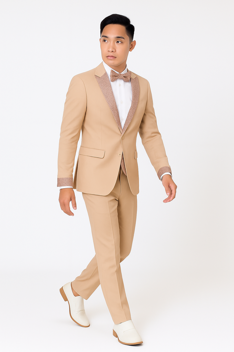 Men's rose gold prom tuxedo: fitted jacket with sparkling lapel, beige trousers, white shirt, rose gold bow tie, and cuff accents. Includes white slip-on shoes for a polished look.
