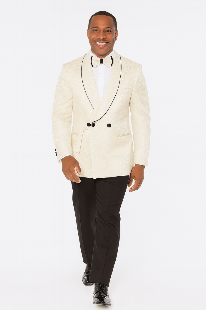 Men's champagne wedding tuxedo. Three-piece suit: textured cream jacket, black lapels & buttons, black trousers. Includes bow tie. Formal and stylish.
