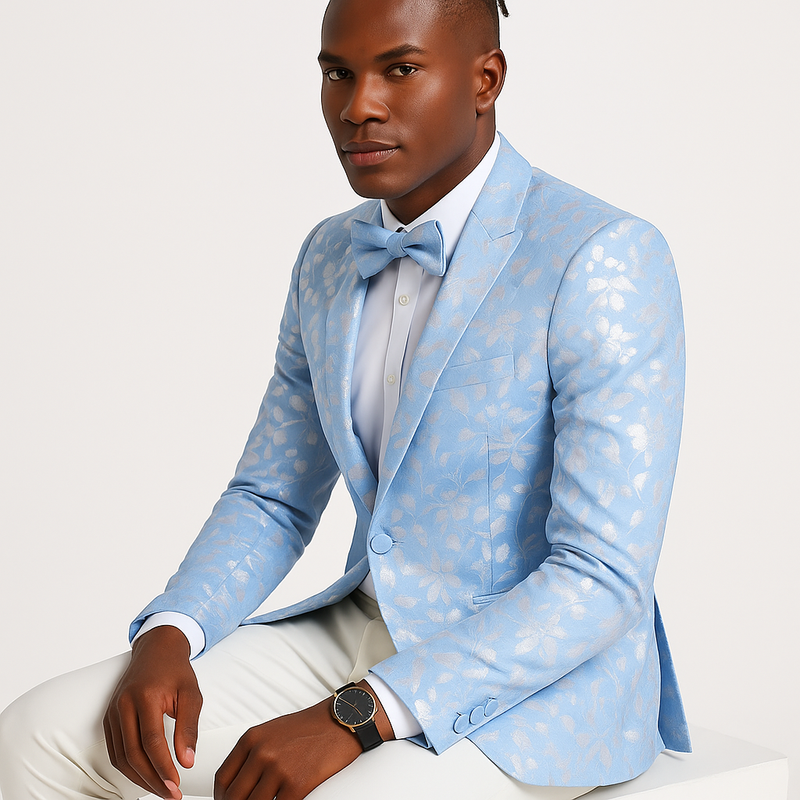 Sky blue slim-fit tuxedo dinner jacket with silver paisley foil. Single-button closure, peak lapels, and structured silhouette. Features a subtle sheen.
