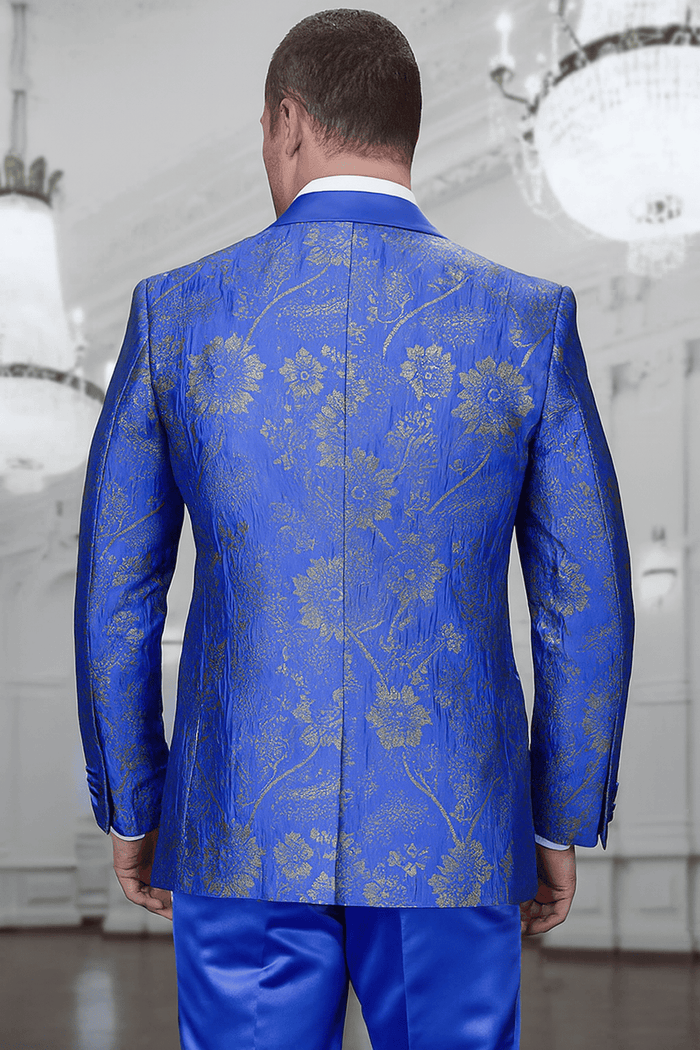 Royal blue tuxedo for men with paisley lace print. Structured jacket, double-breasted vest, and gold floral embellishments. A sophisticated formal look.
