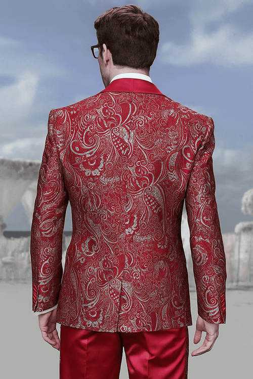 Men's red paisley brocade prom tuxedo: fitted double-breasted jacket, silver & red paisley, and a red satin vest.
