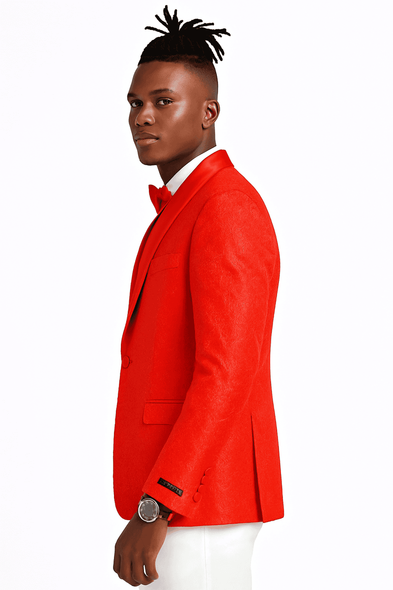 Red slim-fit men's tuxedo jacket with tonal paisley pattern. Structured silhouette, notched lapels, single-button closure, and flap pockets. Vibrant, solid red color.
