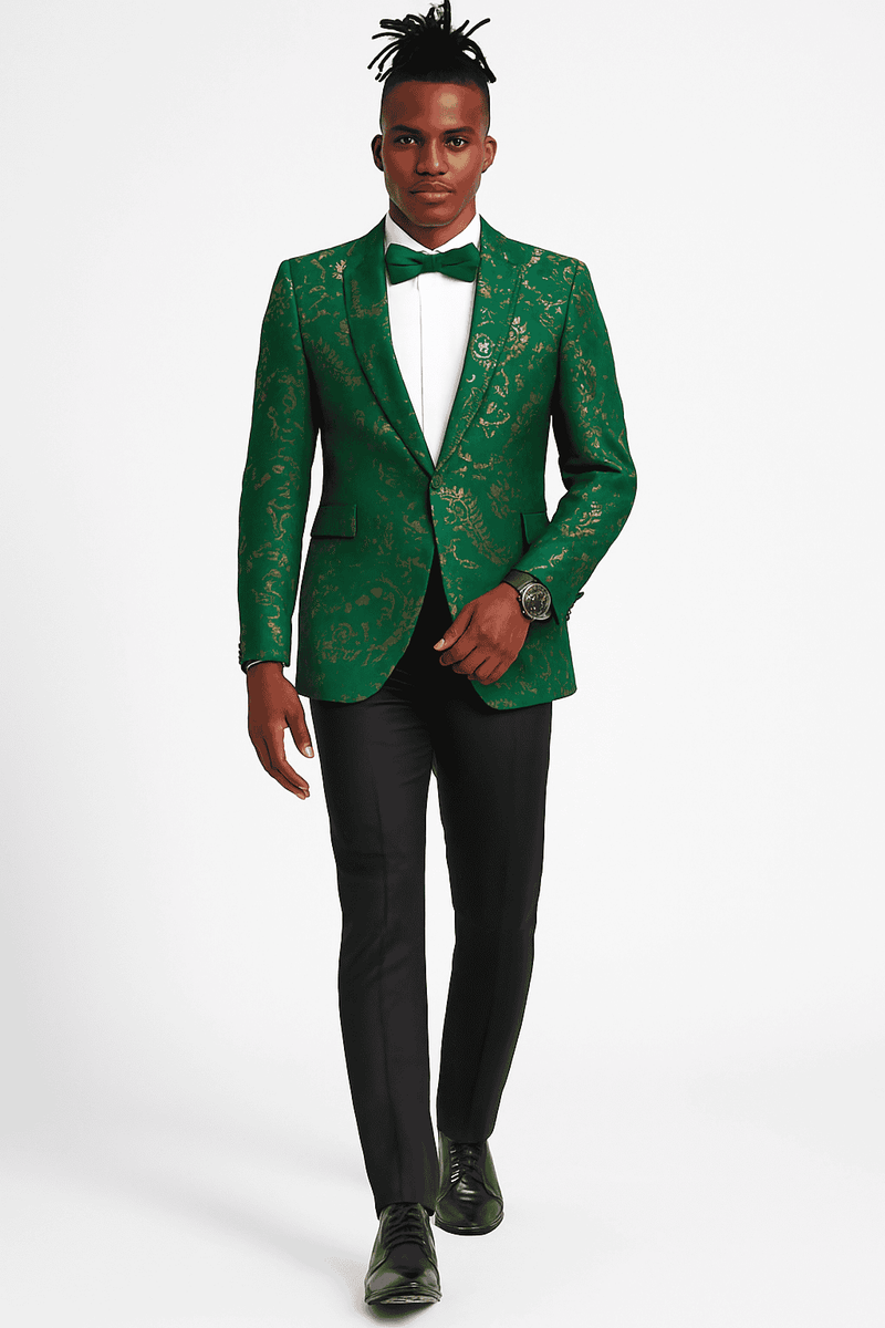 Men's slim fit tuxedo jacket in hunter green with gold paisley. Structured shape, peaked lapels, single-button closure. Smooth, glossy fabric enhances the intricate design.
