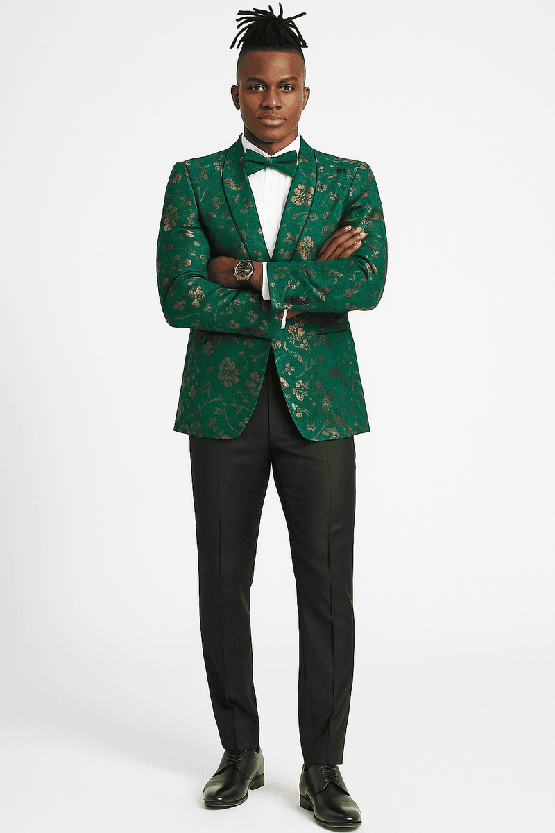Hunter green slim-fit tuxedo jacket. Gold paisley pattern, notched lapels, and a single-button closure. Textured fabric with an intricately woven design.
