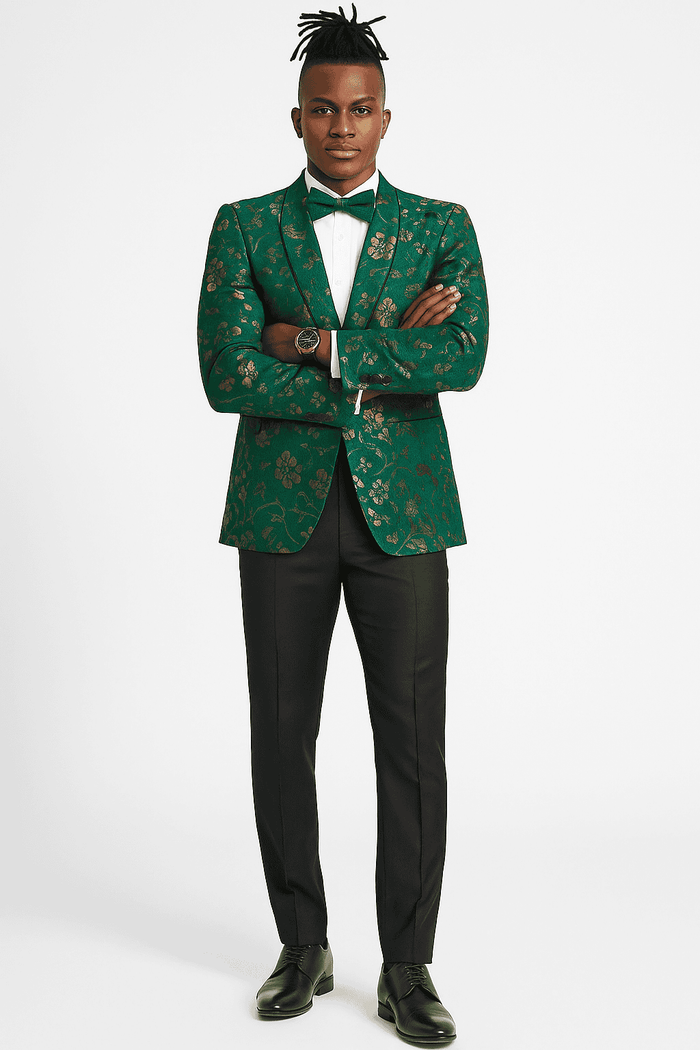 Hunter green slim-fit tuxedo jacket. Gold paisley pattern, notched lapels, and a single-button closure. Textured fabric with an intricately woven design.
