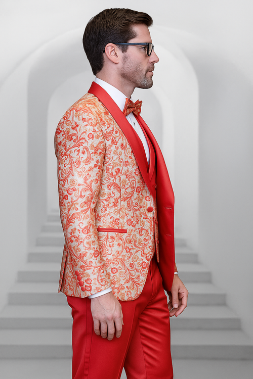 Coral orange paisley tuxedo for men. Shiny patterned jacket with notched lapel and decorative buttons. Solid coral orange pants. Includes matching bow tie and vest. Glossy material. Perfect for weddings.
