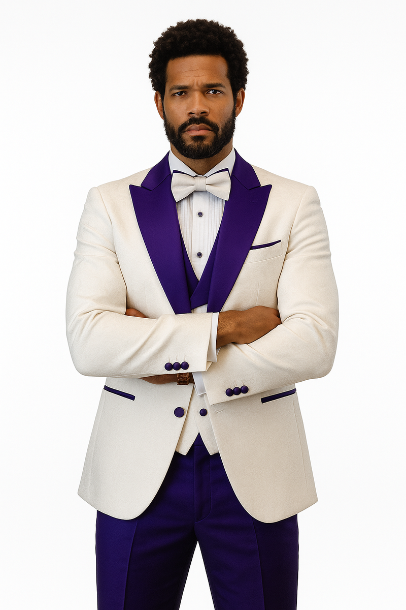 Cream tuxedo jacket with purple peak lapel, matching vest & pants. Features purple button & pocket detailing. Complete with bow tie.
