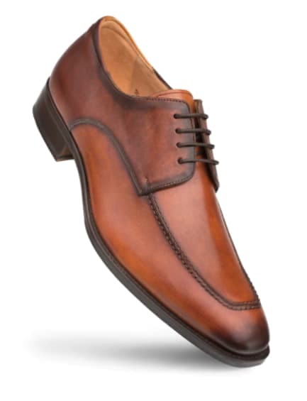 Mezlan Coventry oxfords: Cognac calfskin, gradient color. Smooth, rounded toe, subtle stitching, and a structured design. Black sole. Classic lace-up closure with four eyelets.
