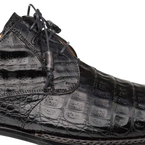 Mezlan men's Derby shoes. Glossy black crocodile pattern, rounded toe, and lace-up closure. Subtle stitch detail. Black, sturdy sole. Stylish and durable.
