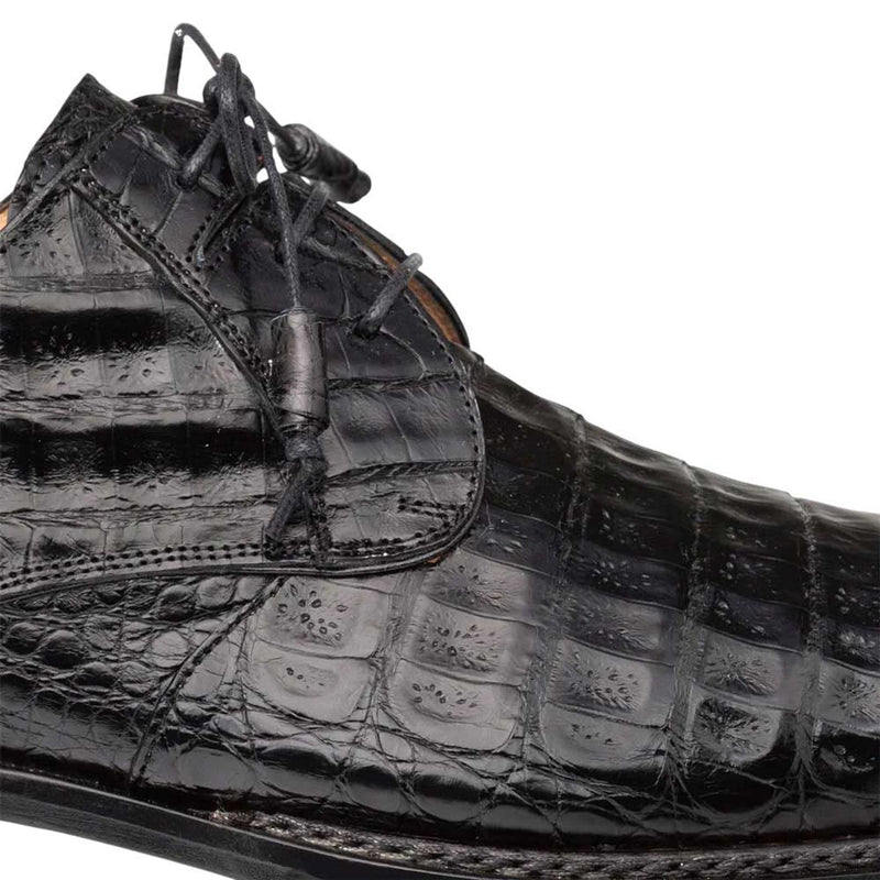 Mezlan men's Derby shoes. Glossy black crocodile pattern, rounded toe, and lace-up closure. Subtle stitch detail. Black, sturdy sole. Stylish and durable.
