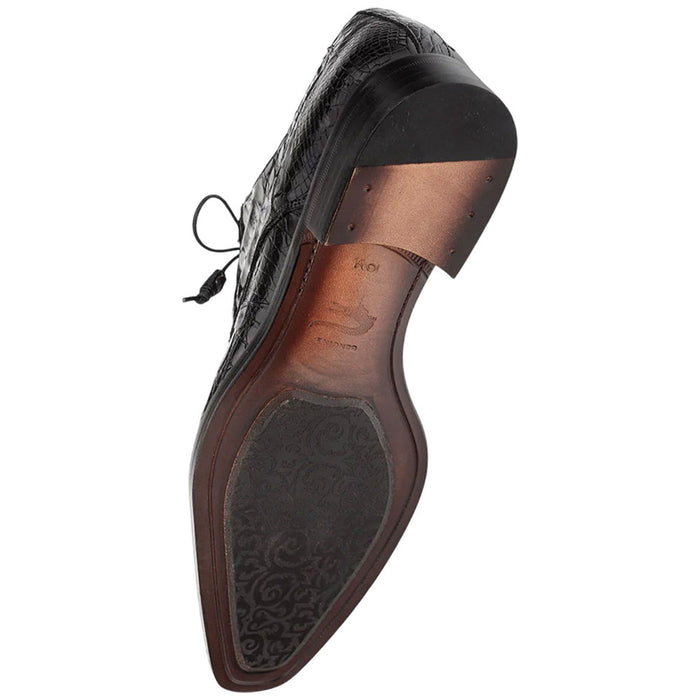 Mezlan Men's Cratos black crocodile derby shoes. Elongated shape, rounded toe, and textured black crocodile upper. Brown detailed sole, slightly elevated heel, and lace-up closure.
