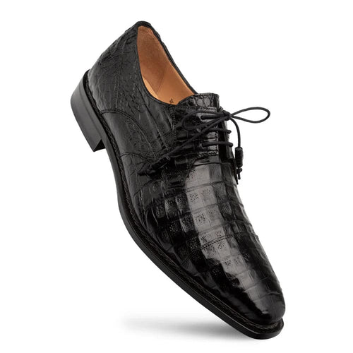 Mezlan's Giovane Derby: Black genuine crocodile cap toe. Sleek black, pointed toe, traditional lacing. Cap toe design, elevated black sole. Luxurious texture and style.
