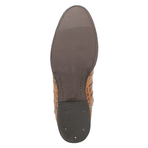 Tan Dingo leather boots: round toe, flat sole with horizontal grooves, mixed textures, and a slightly raised, darker heel.
