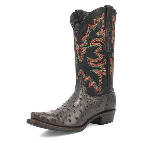 Black snip-toe cowboy boots. Textured brown leather lower with raised dots. Multicolored embroidered upper shaft. Slightly pointed toe, low heel for structure.
