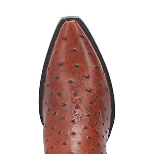 Dingo cognac snip toe cowboy boots. Brown, textured leather upper with raised dots. Pointed snip toe. Black sole.
