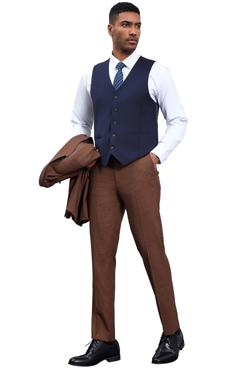 Navy vest with peak lapels, paired with cognac brown micro-check pants. Includes a white dress shirt and a matching cognac jacket. A stylish men's ensemble.
