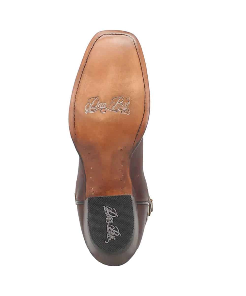 Dan Post Women's Tamara Boot with round toe, stacked heel. Tan leather sole with black rubber. Embossed branding and smooth outsole texture.
