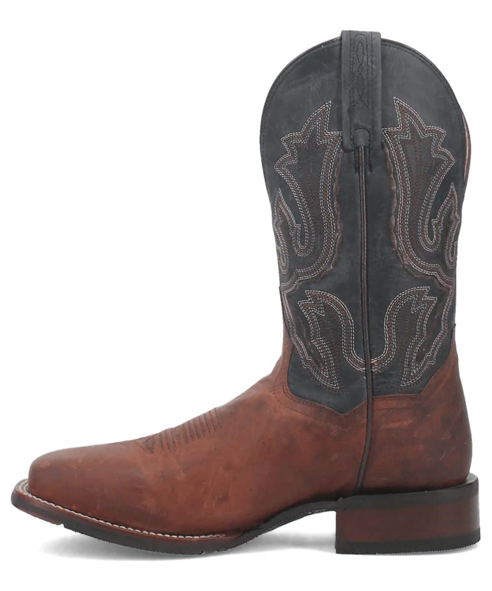 Dan Post Men's Winslow Boot: Classic western boot with a tall silhouette and rounded toe. Black leather upper with detailed stitching and a brown vamp. Elevated, stacked heel.
