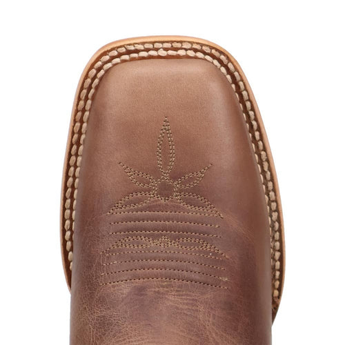 Dan Post Lacey women's tan leather western boot. Square toe with lightly textured leather. Features decorative floral stitching on the toe. Stitched sole for durability.
