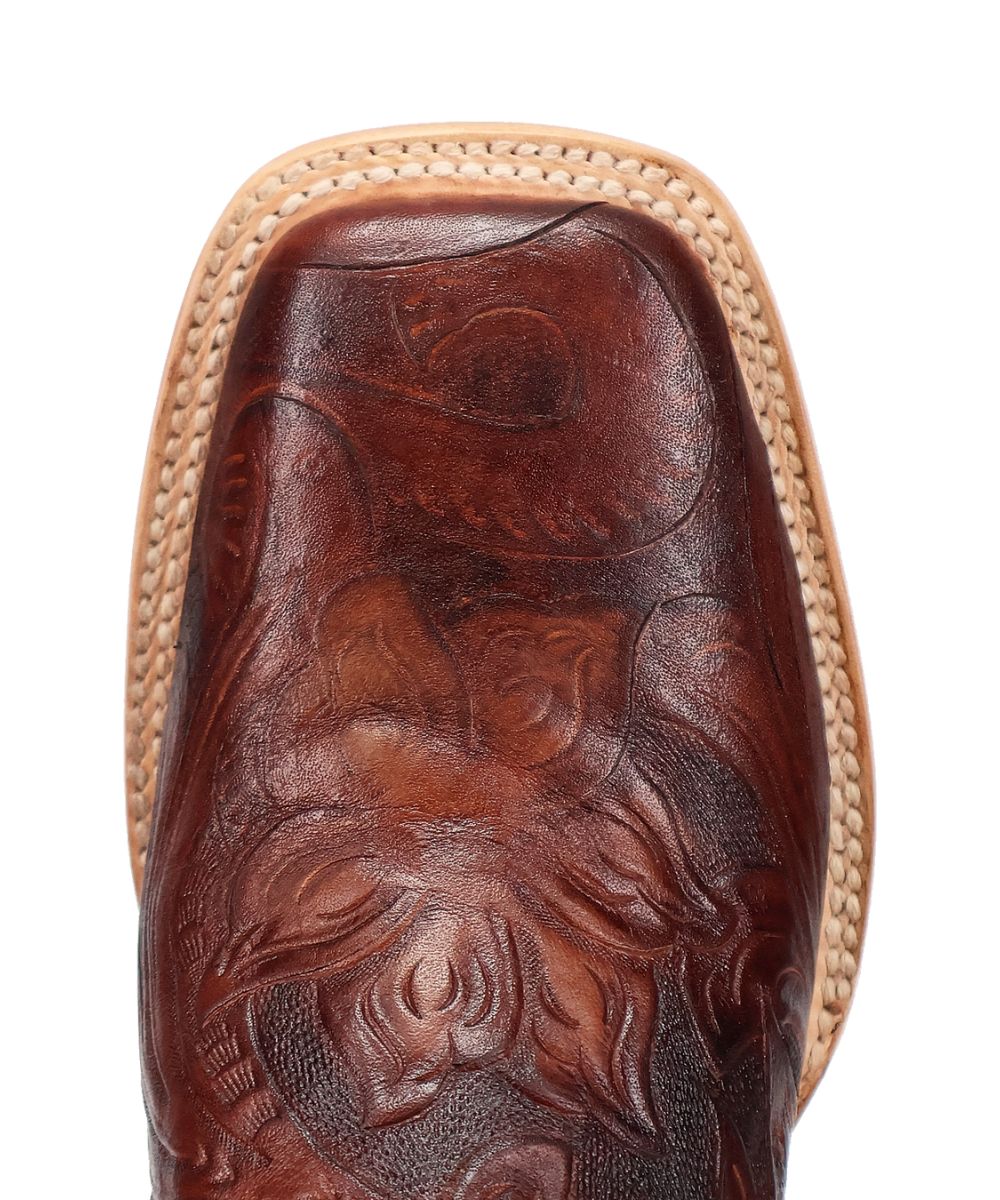 Dan Post Layla women's boot. Rich brown leather with pointed toe, floral embossed pattern. Tan stitching detail adds craftsmanship to the upper sole.
