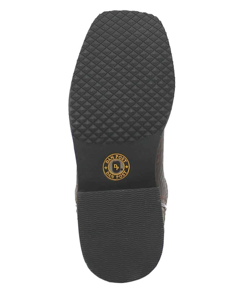 Dan Post Kids Creek Boot: Black rubber sole with diamond tread and circular logo. Slightly raised, tapered heel for grip and style.
