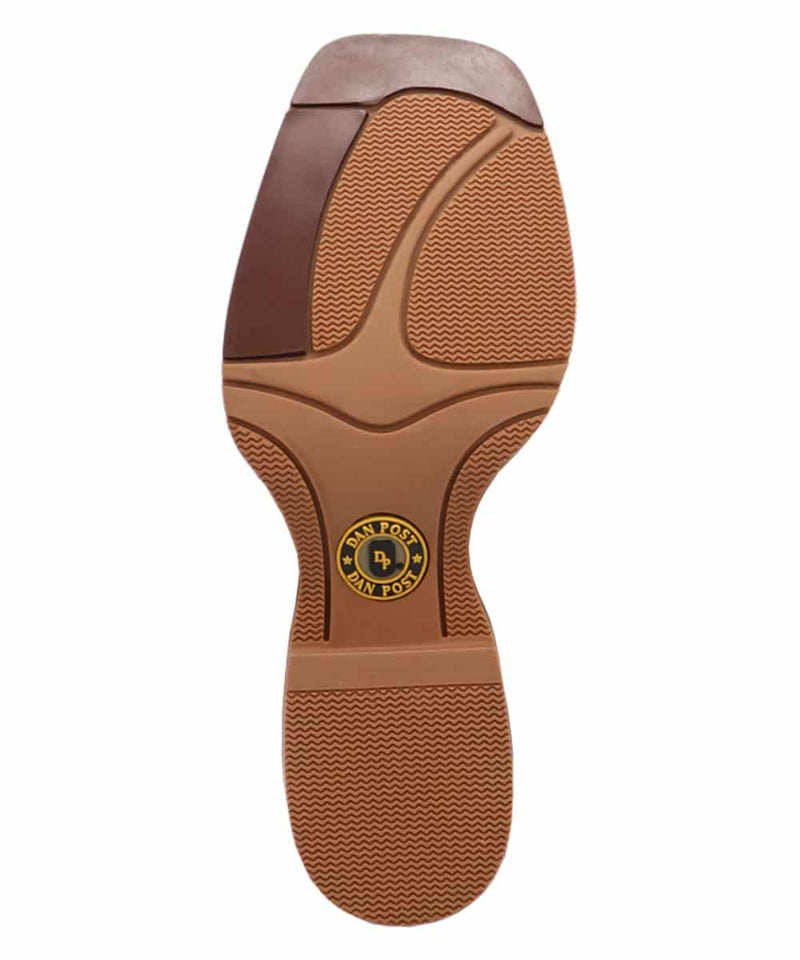 Dan Post Youth Girls Salina Boot: Brown rubber outsole with textured details and a central circular logo/star pattern. Raised heel, smooth transitions, structured design.
