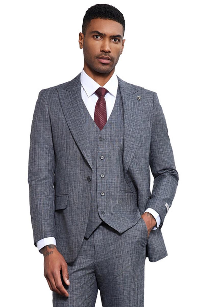 Gray Stacy Adams suit: sharkskin weave, structured blazer (notch lapels, pockets), matching 5-button vest, slim-fit trousers. Textured fabric, classic style.