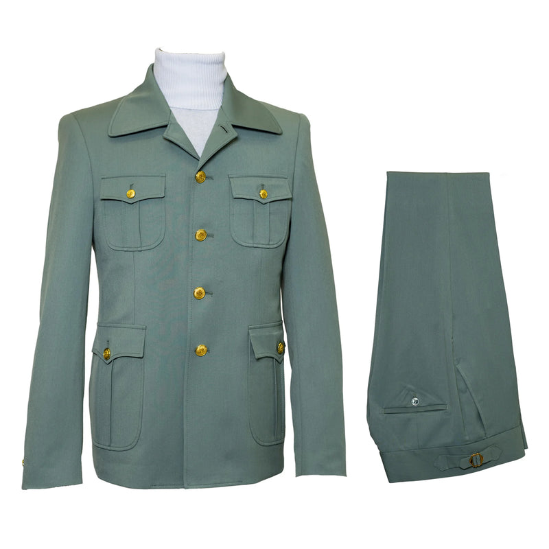 Mint green seersucker suit with peak lapels, gold buttons, and fitted jacket. Features two chest/lower pockets & streamlined trousers with belt loop and single hem button.
