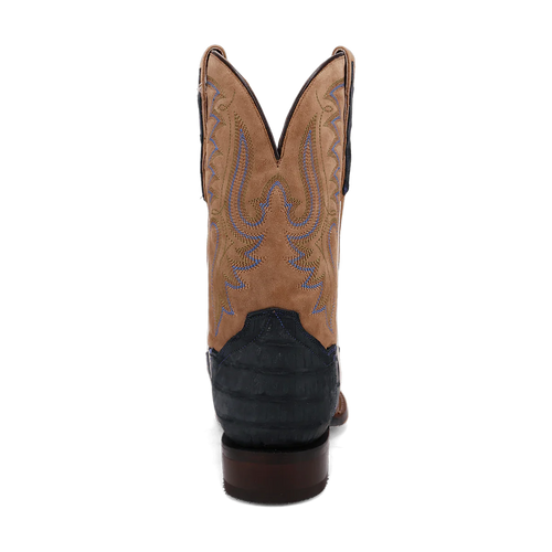 Dan Post Leon boots: tan suede upper with blue stitching, dark caiman foot. Square toe, pointed shaft with scalloped top. Stacked wooden heel. Combines suede/caiman textures.
